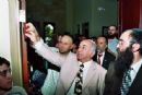 Affixing the Social Hall mezuzah Affixing the Social Hall mezuzah